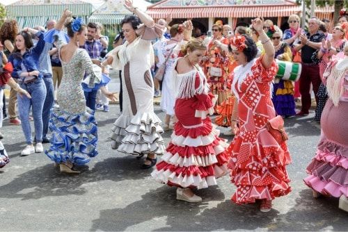 Descubre la magia de bailar sevillanas en la Feria de Abril